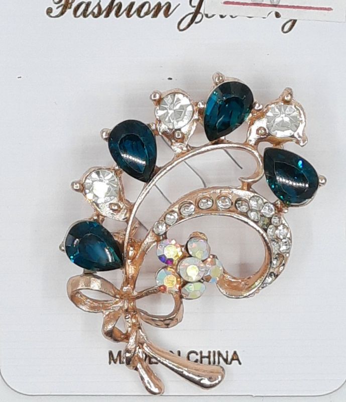 Brooch Тstones in goldУ in assortment.